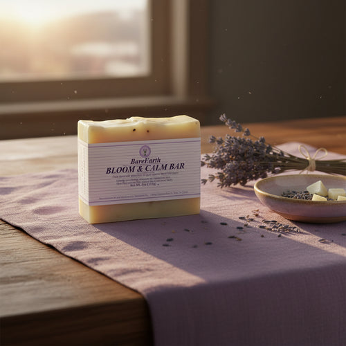 Bloom & Calm lavender soap bar with dried lavender bouquet, ceramic bowl, purple linen